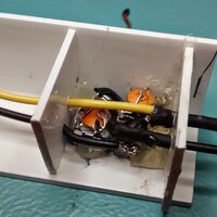 The dimmer in a plastic case